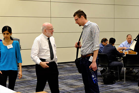 Dr. David Kaufman talks with Matt Jackson, post-doc in the Soper group, at the lunch break.
