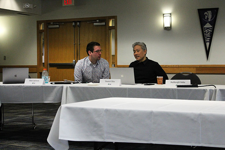 Dr. Matt Jackson (left) chats with Dr. Daniel Chiu (right), a center collaborator