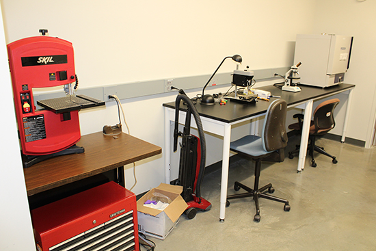 Chip prep room, displaying a red machine and table with equipment on it