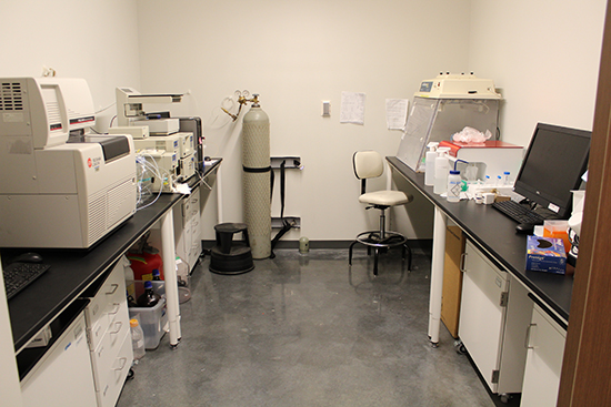 Separation room, a small room with tables on the left and right walls, full of equipment