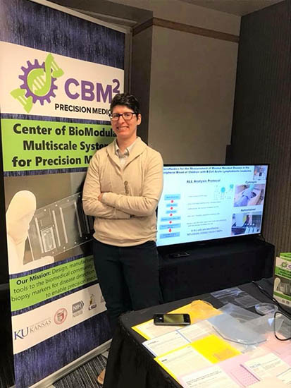 Dr. Bethany Gross in the CBM2 exhibitor booth.