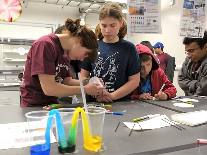 Kids working together at science table